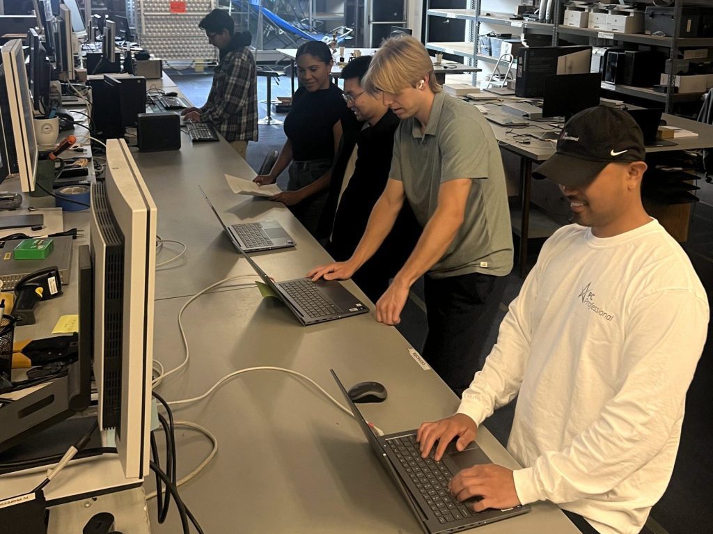 PC Professional Engineers working at the benching desk.