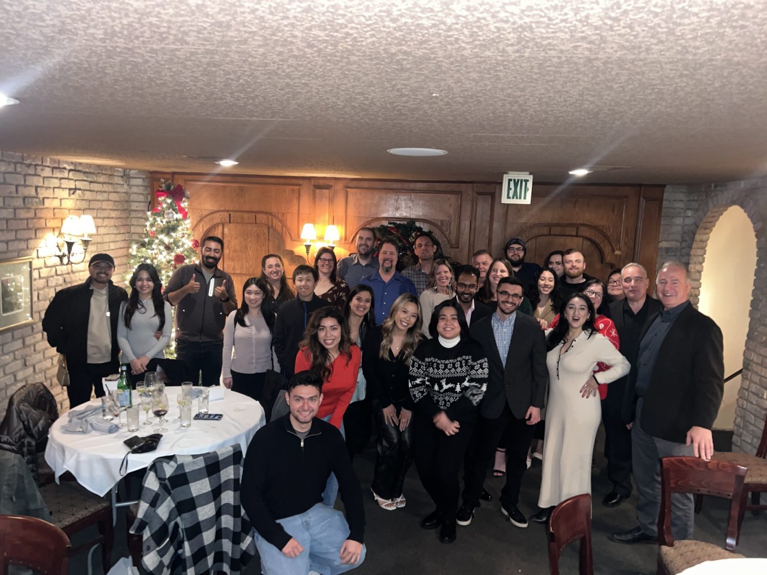 The PC Professional team standing inside a restaurant.